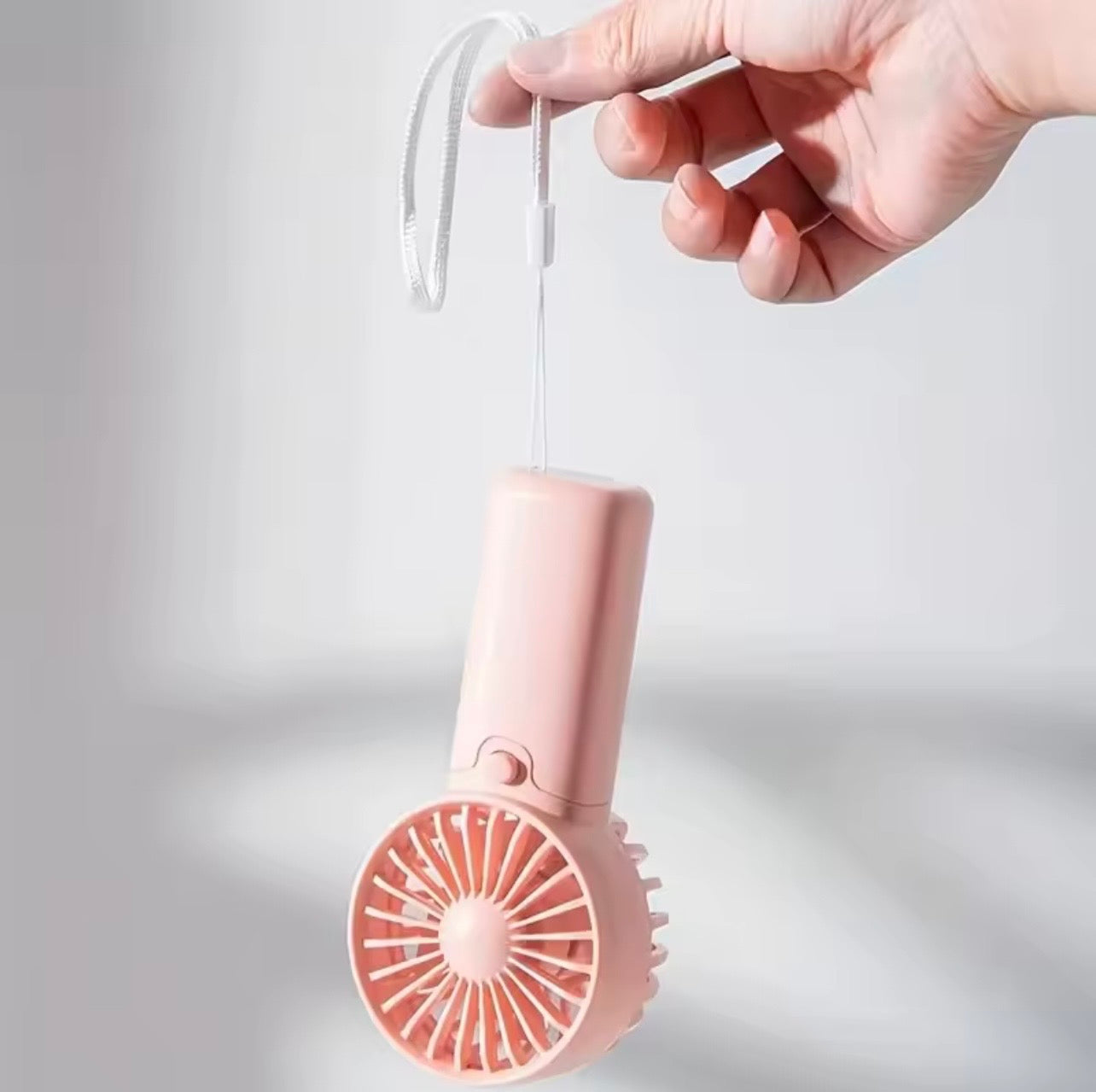 Dites Adieu à la Chaleur – Mini Ventilateur Portable Rechargeable Ultra Léger
